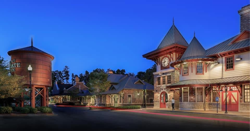 North Gate Station at dusk, with its clock tower and water tower